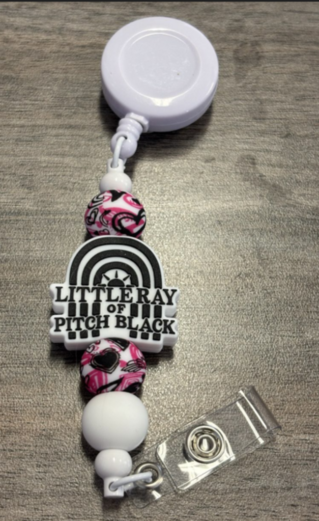 Pitch black badge reel