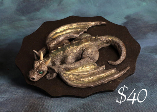 Polymer clay resting dragon