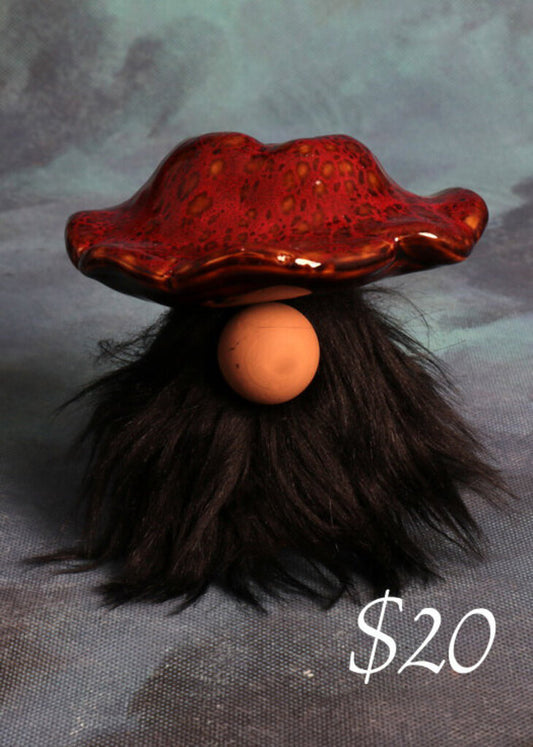 Mushroom gnome with red hat