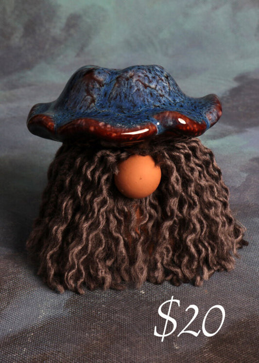 Mushroom Gnome with blue hat and curly hair