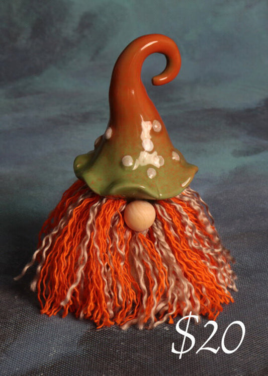 Small curly hat gnome with orange hat and hair