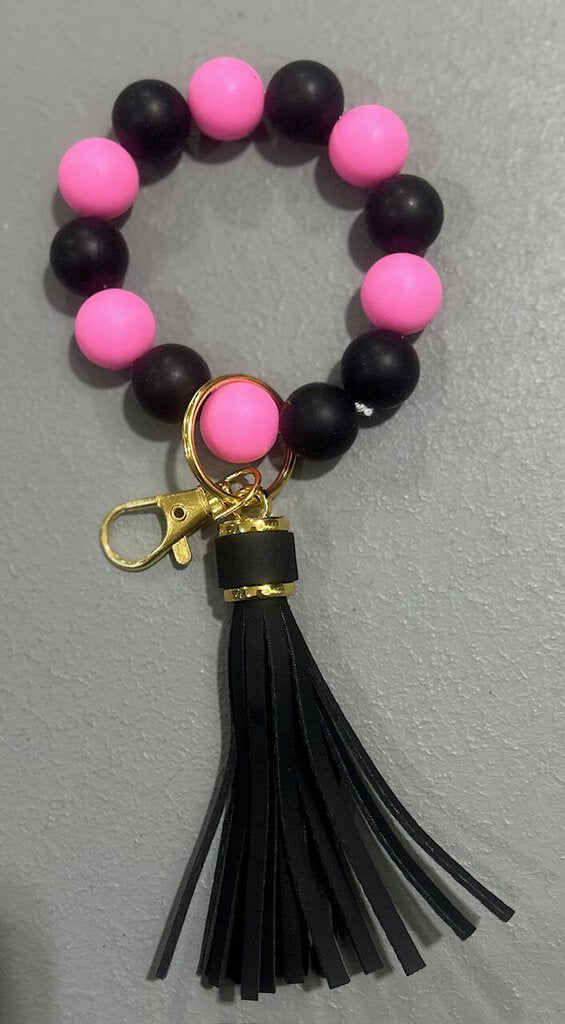 Pink and black wristlet