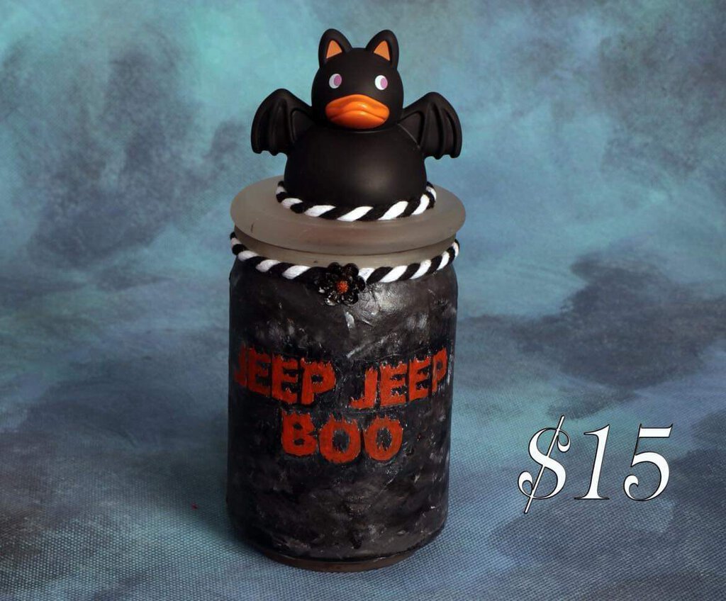 candle with bat on top - black -- lc