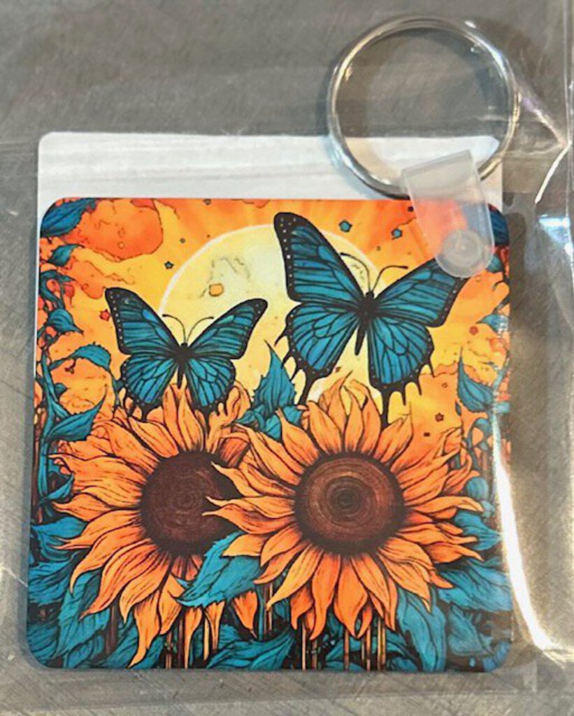 TealyellowButterflyflower SQ KC